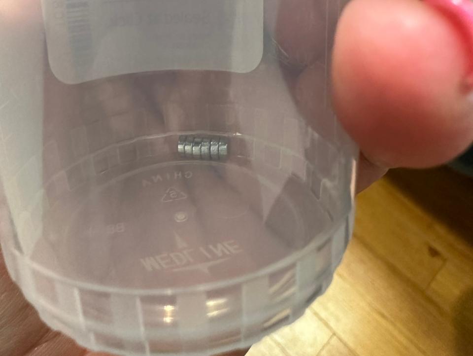 6 tiny magnets inside a specimen cup