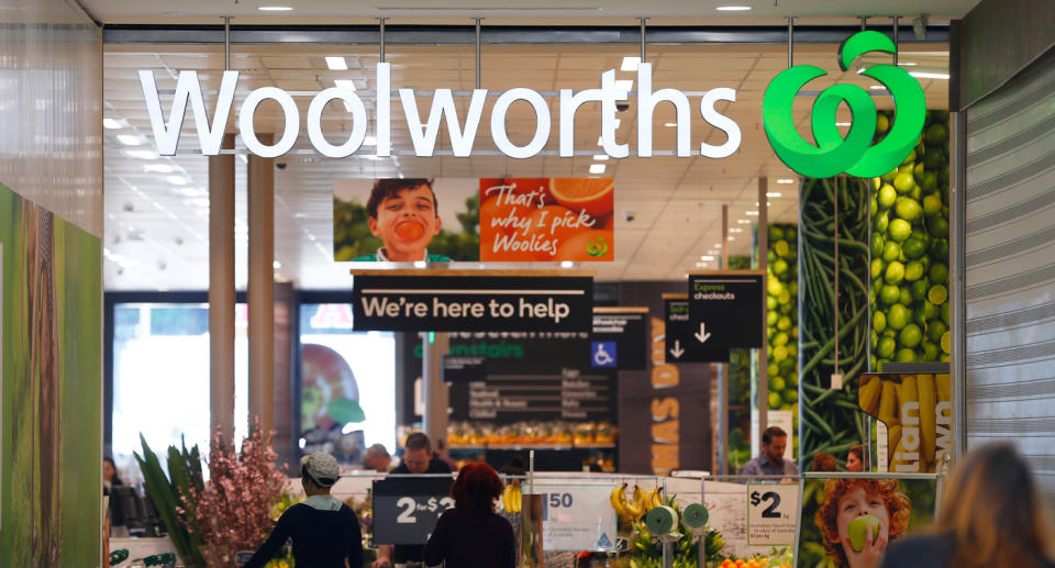 A Woolworths sign. A shopper said he found feathers still attached to his chicken meal.