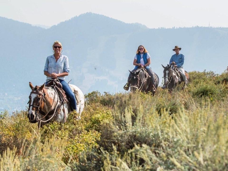 Wyoming- The author leads her parents on a. trail ride at Spring Creek Ranch in Jackson Hole, Wyoming