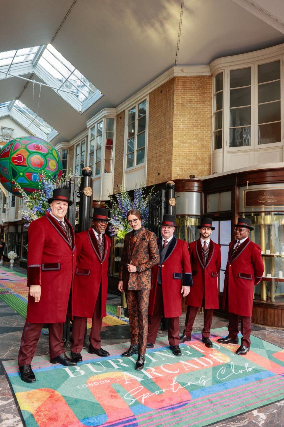 Tailor Joshua Kane with the Beadles wearing their new uniforms in Burlington Arcade (Burlington Arcade)