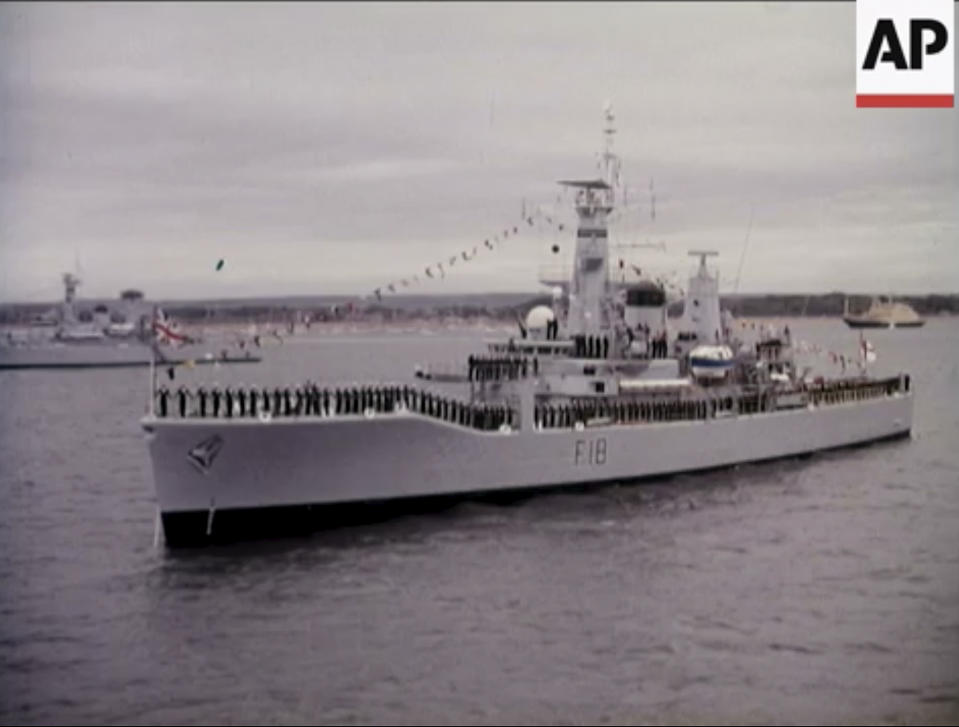 An image from video taken in 1977 showing HMS Galatea, a a Leander-class frigate, which Lt. Cmdr. Robert Embleton served on near the Arctic Circle, during the Cod War of 1976 — confrontations between Britain and Iceland over North Atlantic fishing rights. From resounding applause to ostracization and isolation. That's essentially the journey Lt. Cmdr. Robert Embleton, who served 34 years in Britain's Royal Navy, took by ambulance when discharged from Derriford Hospital in Plymouth, southwest England, on April 8 following his near-month sickness with the coronavirus. (Courtesy of Robert Embleton via AP)