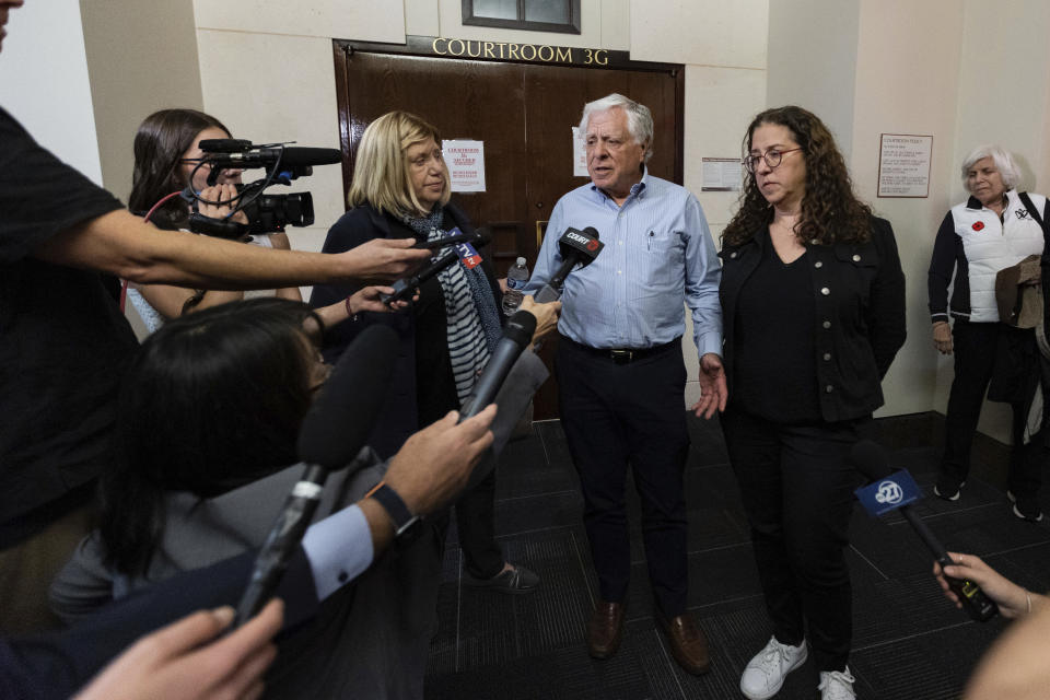 Phil Markel responds to a question outside the courtroom where a jury found Charlie Adelson guilty on all three charges for the murder of his son, Dan Markel, on Monday, Nov. 6, 2023, in Tallahassee. A jury has convicted Adelson, a Florida dentist of murder and other charges in the 2014 slaying of his former brother-in-law, a prominent professor killed following a bitter custody battle with the dentist's sister. (Alicia Devine/Tallahassee Democrat via AP, Pool)/Tallahassee Democrat via AP, Pool)