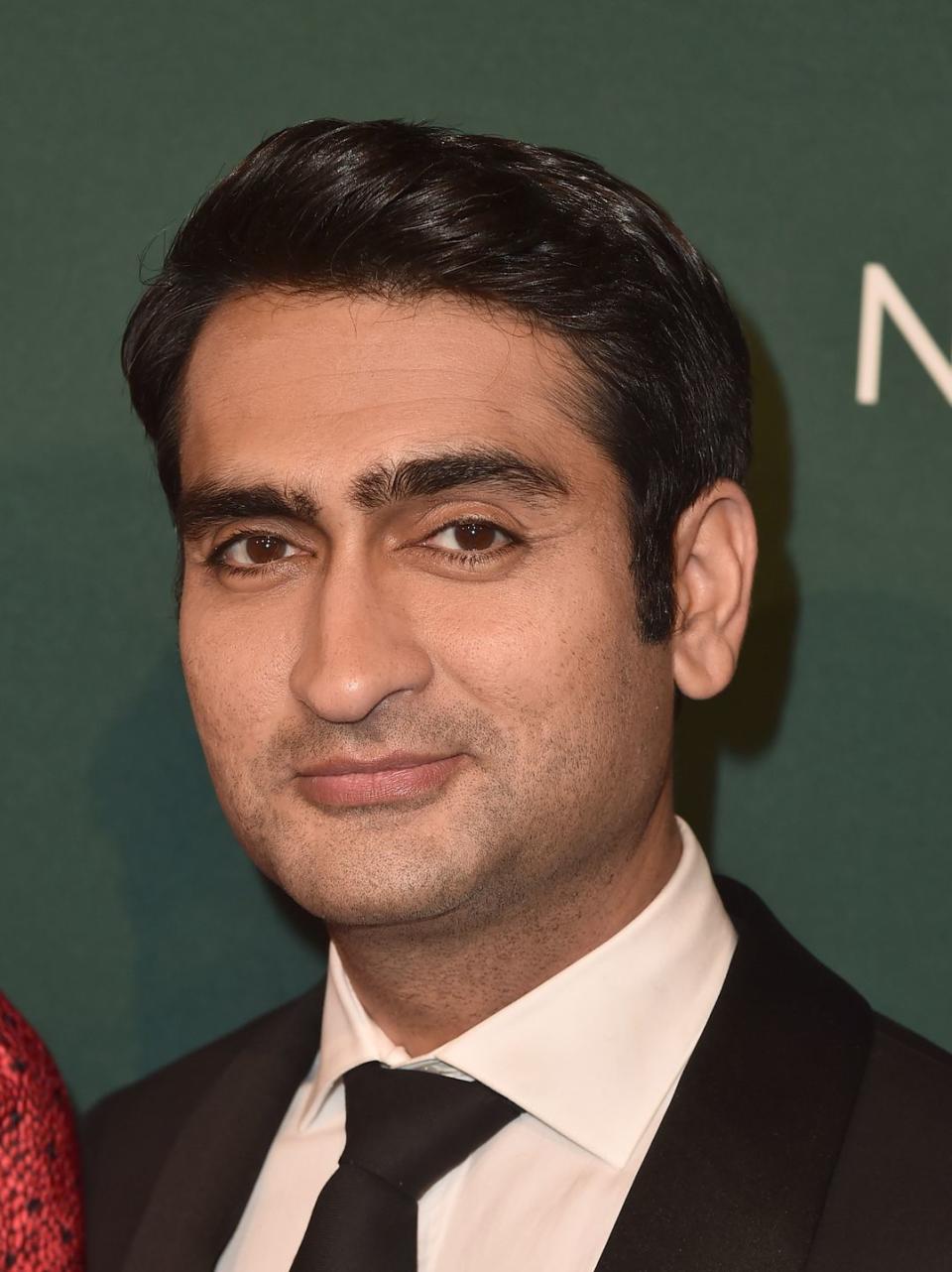 kumail nanjiani smiles in close up