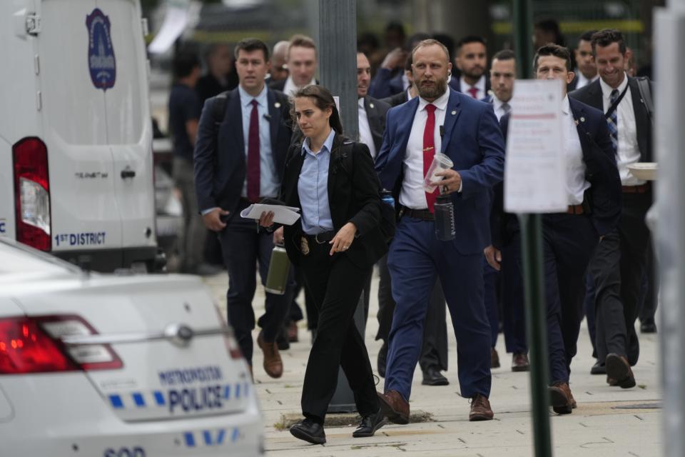 Secret Service personnel prepare outside of the E. Barrett Prettyman United States Courthouse before Former President Donald Trump arrives to be arraigned on four charges related to the 2020 election. Federal prosecutors are accusing the Trump of undermining American democracy by organizing a wide-ranging conspiracy to steal the 2020 election that prosecutors allege fueled a brazen and historic insurrection at the U.S. Capitol.