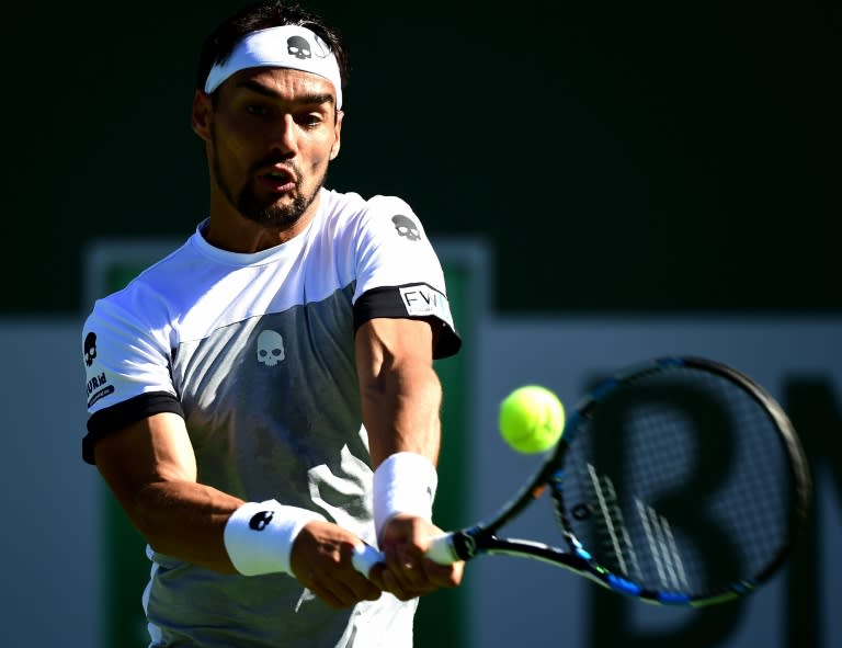 Fabio Fognini of Italy hits a backhand to Jo-Wilfried Tsonga of France during their BNP Paribas Open match at Indian Wells Tennis Garden in California, on March 11, 2017