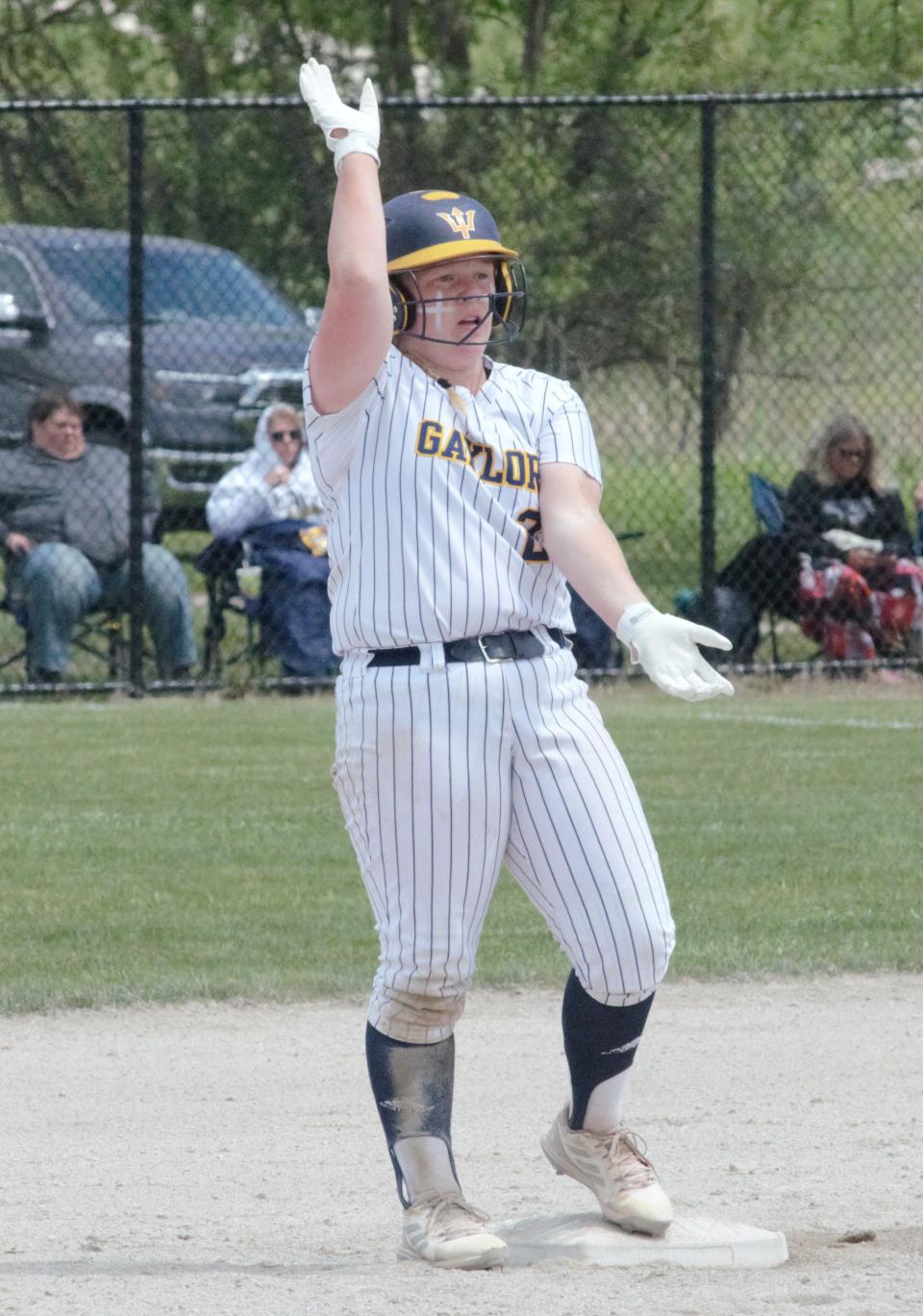 Taylor Moeggenberg celebrates after hitting a double during the MHSAA Division 2 district semifinal game with Gladwin on Saturday, June 4 at Petoskey High School.
