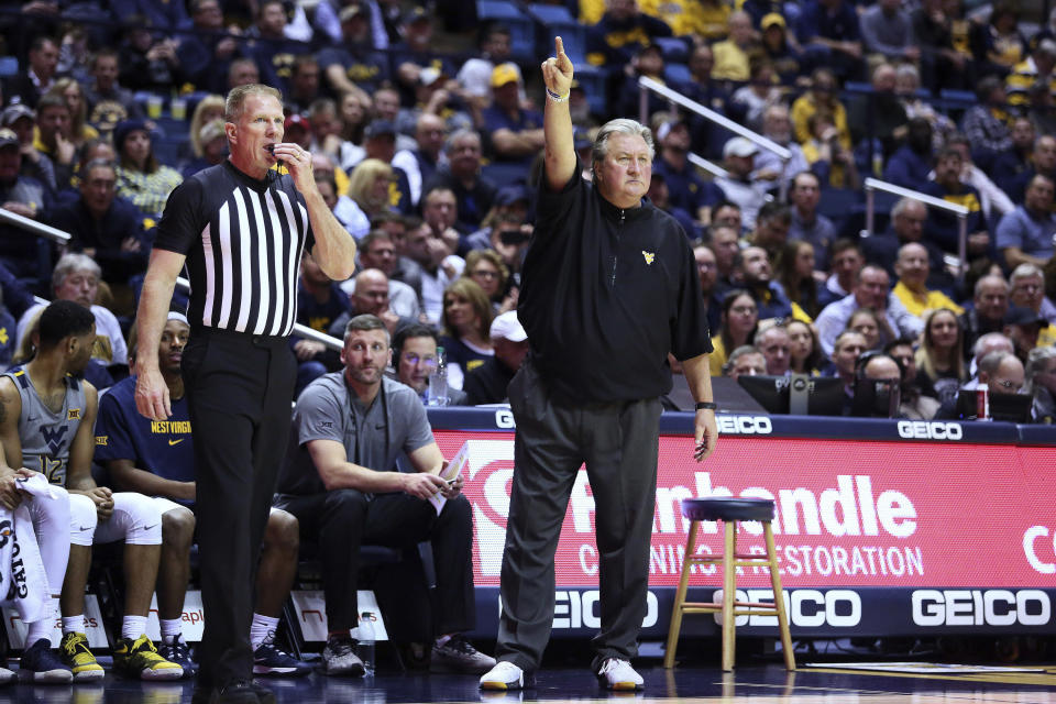 West Virginia coach Bob Huggins reacts to a play during the second half of the team's NCAA college basketball game against TCU on Tuesday, Jan. 14, 2020, in Morgantown, W.Va. (AP Photo/Kathleen Batten)