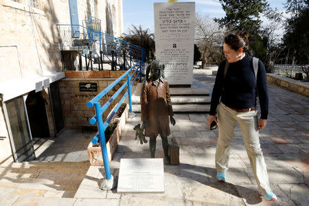 A woman looks at a sculpture by Sam Philipe commemorating children killed in the Holocaust, near the entrance to 'The Chamber of the Holocaust', a little-known memorial site for Jewish victims of the Nazi Holocaust, in Jerusalem's Mount Zion January 23, 2019. REUTERS/Ronen Zvulun