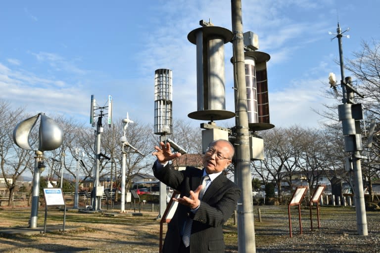 Izumi Ushiyama, a professor and expert of wind power at Ashikaga Institute of Technology, speaks at the natural energy square in Ashikaga, Tochigi prefecture