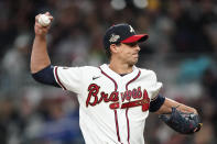 Atlanta Braves starting pitcher Charlie Morton (50) delivers in the fifth inning of a baseball game against the Cincinnati Reds Friday, April 8, 2022, in Atlanta. (AP Photo/John Bazemore)