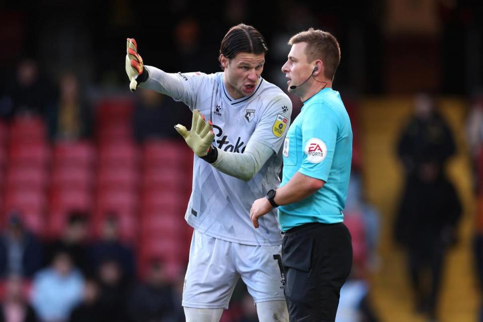 Daniel Bachmann exchanges views with Josh Smith last season <i>(Image: PA)</i>