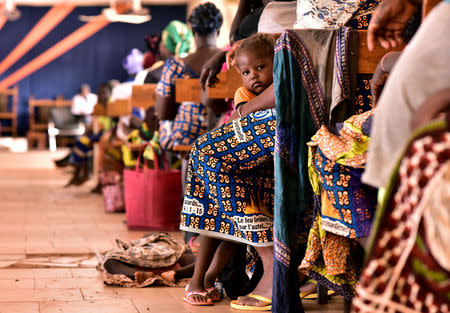 Displaced protestants, who fled Dablo and its surroundings, attend a church service in the city of Kaya, Burkina Faso May 16, 2019. Picture taken May 16, 2019. REUTERS/Anne Mimault