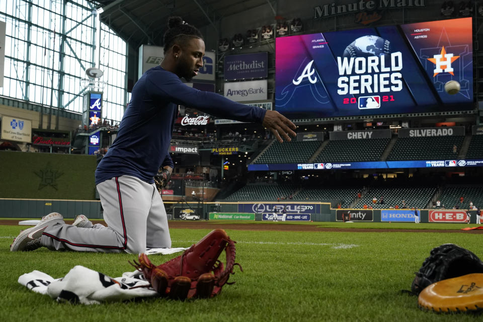 Atlanta Braves second baseman Ozzie Albies warms up during batting practice before Game 1 in baseball's World Series against the Houston Astros Tuesday, Oct. 26, 2021, in Houston. (AP Photo/Ashley Landis)