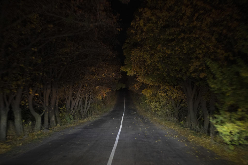 A main road leads to the frontline in the Sloviansk region, Ukraine, Wednesday, Oct. 25, 2023. (AP Photo/Bram Janssen)