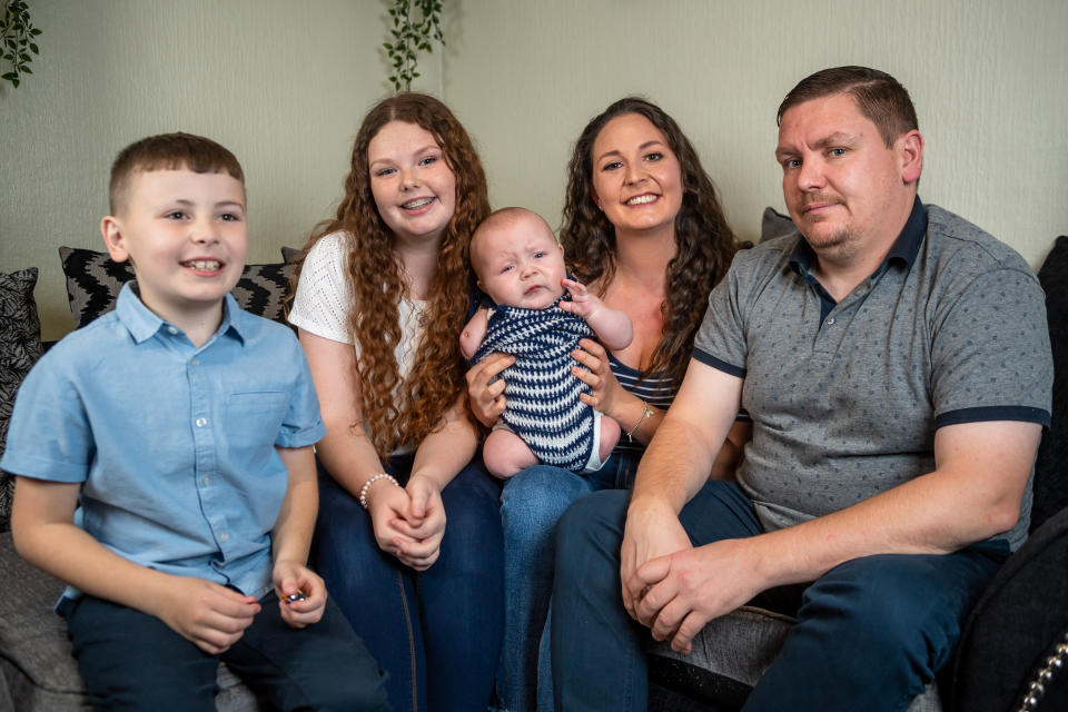 Henry with his siblings Michael and Alice, mum Rosie and dad Peter. (SWNS)