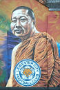 <p>A mural of the Leicester owner Vichai Srivaddhanaprabha, following a helicopter in a car park near the stadium shortly after 8.30pm on Saturday evening. Aaron Chown/PA Wire </p>