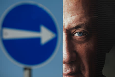 A part of a campaign billboard of Benny Gantz, a former Israeli armed forces chief and the head of a new political party, Israel Resilience, can be seen in Tel Aviv, Israel January 29, 2019 REUTERS/Amir Cohen