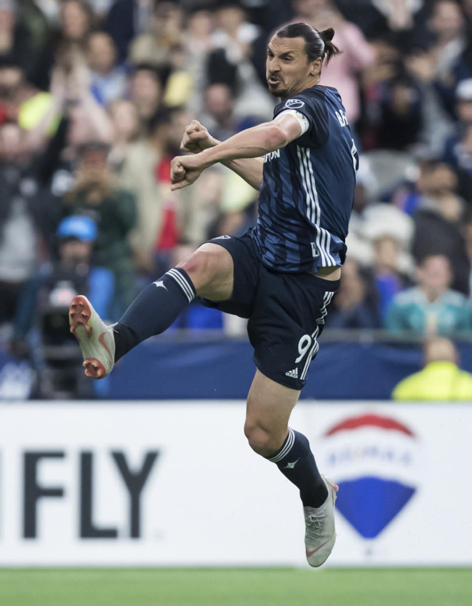 LA Galaxy's Zlatan Ibrahimovic celebrates after scoring a goal against the Vancouver Whitecaps during the second half of an MLS soccer match Friday, April 5, 2019, in Vancouver, British Columbia. (Darryl Dyck/The Canadian Press via AP)