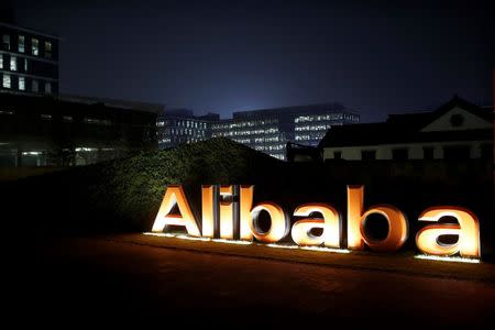 The logo of Alibaba Group is seen inside the company's headquarters in Hangzhou, Zhejiang province early November 11, 2014. REUTERS/Aly Song