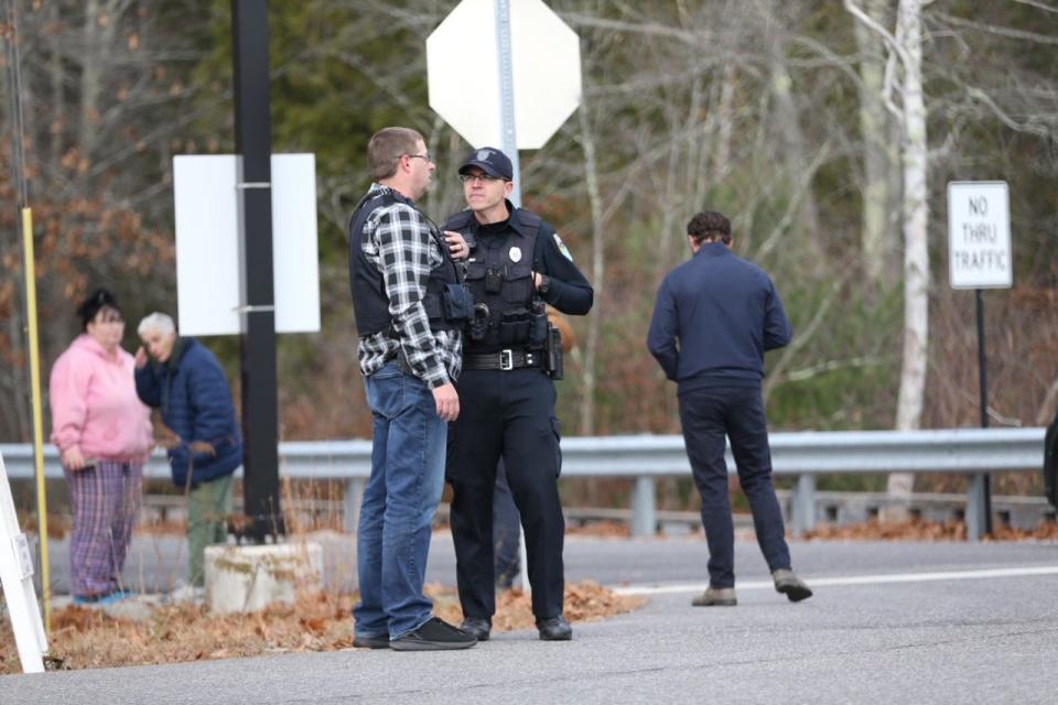 Police rushed to Sanford High School in Maine Tuesday morning, Nov. 15, 2022, for what they say was a hoax report of a shooting there and at schools around the state. Students were being evacuated as part of a lockdown process as a precaution.