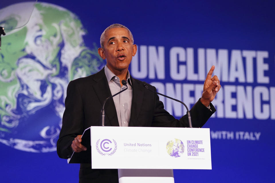 Former U.S. President Barack Obama gestures as he speaks during the COP26 U.N. Climate Summit in Glasgow, Scotland, Monday, Nov. 8, 2021. The U.N. climate summit in Glasgow is entering it’s second week as leaders from around the world, are gathering in Scotland's biggest city, to lay out their vision for addressing the common challenge of global warming. (Jane Barlow/PA via AP)