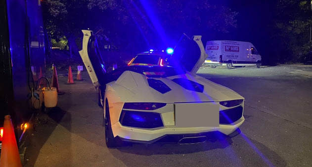 Lamborghini driver is pulled over by police.