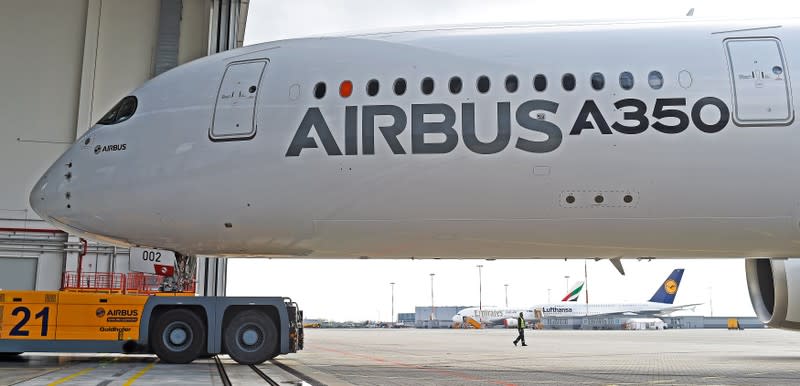 FILE PHOTO: An Airbus A350 XWB flight-test aircraft is towed during a media-day at the German headquarters of aircraft company Airbus in Hamburg-Finkenwerder