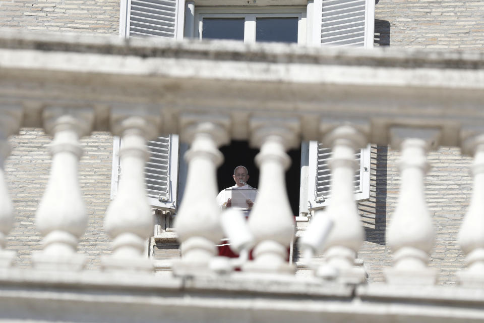 Pope Francis delivers his message during the Angelus noon prayer in St. Peter's Square at the Vatican, Sunday, Feb. 17, 2019. The pontiff is asking for prayers for this week's sex abuse summit at the Vatican, calling abuse an "urgent challenge of our time." (AP Photo/Gregorio Borgia)