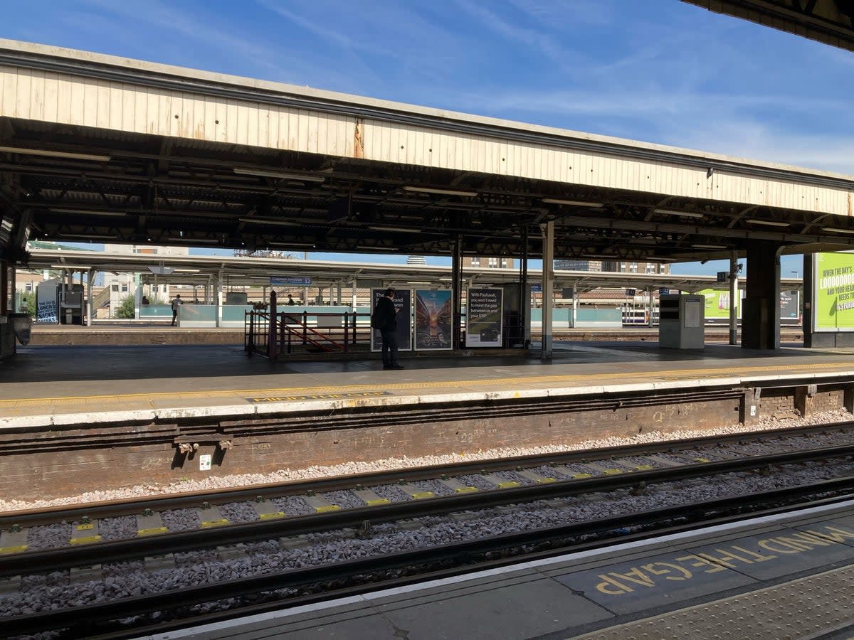 An empty platform at Clapham Junction station in south-west London (PA)