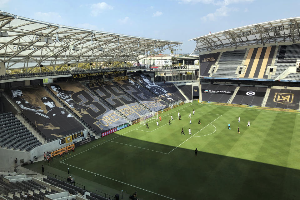 Los Angeles FC and the LA Galaxy play the eighth edition of their rivalry game, El Trafico, at Banc of California Stadium on Saturday, Aug. 22, 2020, in Los Angeles. The game was played behind closed doors as Major League Soccer returns in empty stadiums this week, depriving the rivalry of the energy derived from the clubs’ passionate fan bases. The Galaxy won 2-0. (AP Photo/Greg Beacham)