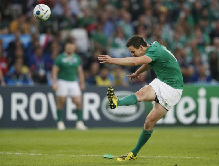 Ireland's fly half Jonathan Sexton kicks a penalty during a Pool D match of the 2015 Rugby World Cup between Ireland and Italy at the Olympic Stadium, in London, on October 4, 2015