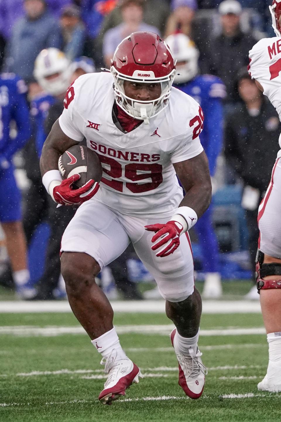 Tailback Tawee Walker, shown with Oklahoma last season, has been impressive this spring for Wisconsin.