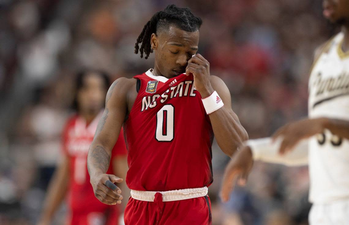 Down by 12 points, N.C. State’s D.J. Horne (0) reacts after missing a three-point attempt with 5:03 to play against Purdue in the NCAA Final Four National Semifinal on Saturday, April 6, 2024 at State Farm Stadium in Glendale, AZ. Purdue defeated N.C. State 63-53. Robert Willett/rwillett@newsobserver.com