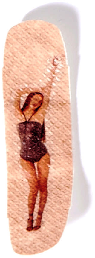 Picture of a small bandage with an image of Olivia Rodrigo wearing a black bodysuit and dancing with one arm stretched above her head printed on the bandage.