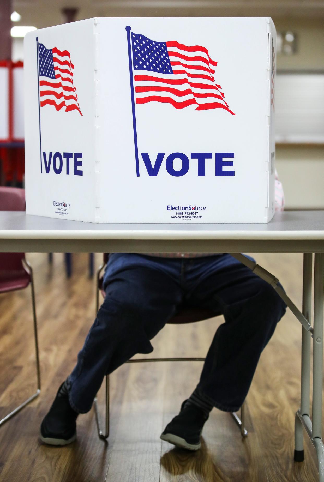 A man votes at Immanuel UCC on Taylorsville Road, Kingsley residents had to sign in by hand due to problems with the electronic signature machine. Signatures were taken manually but Kingsley residents were still able to cast their vote. Nov.7, 2023.