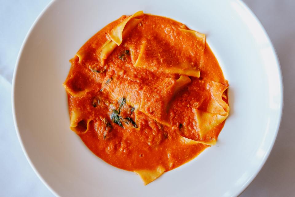 The pappardelle at Rosebud features their original handmade square noodles in a rich tomato basil sauce.