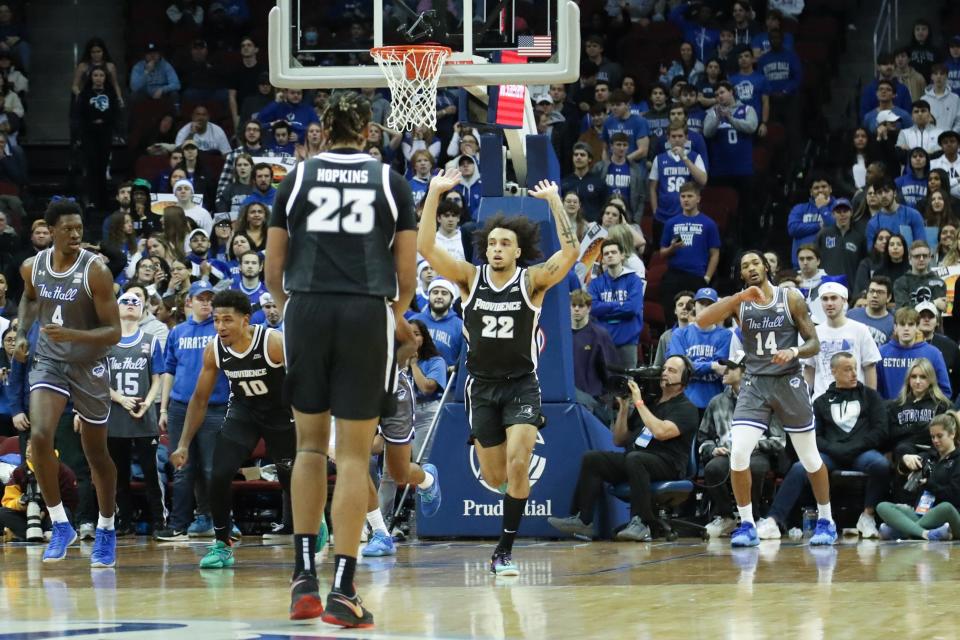 Providence guard Devin Carter (22) celebrates after sinking a shot against Seton Hall in their game last week. On Tuesday, Carter and the Friars will host Marquette.