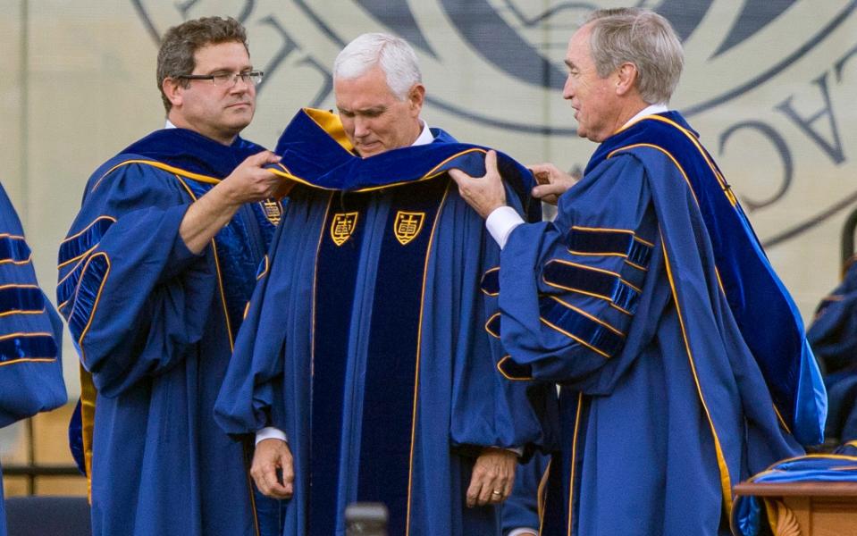 Mike Pence at Notre Dame university in Indiana on Sunday morning - Credit: AP