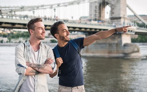 Gay couple exploring Budapest - Credit: Getty