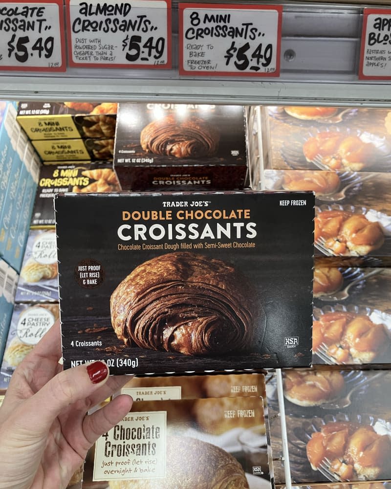 someone holding Double Chocolate Croissants at Trader Joe's store