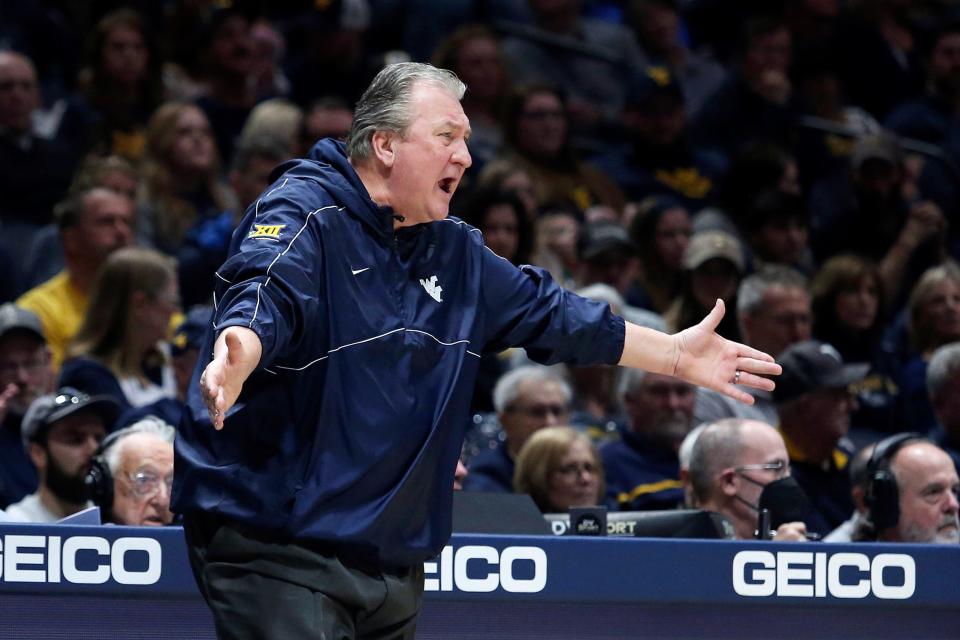 West Virginia coach Bob Huggins reacts during the first half of a game against Texas Tech on earlier this month in Morgantown, West Virginia. On Saturday, the Mountaineers face the Kansas Jayhawks in Lawrence, Kansas.