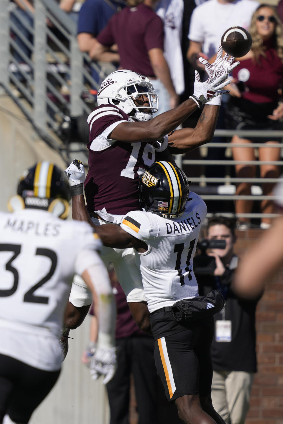 Southern Mississippi cornerback MJ Daniels (11) breaks up a pass intended for Mississippi State wide receiver Freddie Roberson (19) during the first half of an NCAA college football game in Starkville, Miss., Saturday, Nov. 18, 2023. (AP Photo/Rogelio V. Solis)