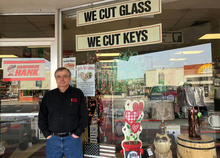 Cash Hogen, owner of Hogen's Hardware Hank, stands in front of his hardware store in Pierre, South Dakota, U.S., February 7, 2018. Picture taken February 7, 2018. REUTERS/Lawrence Hurley