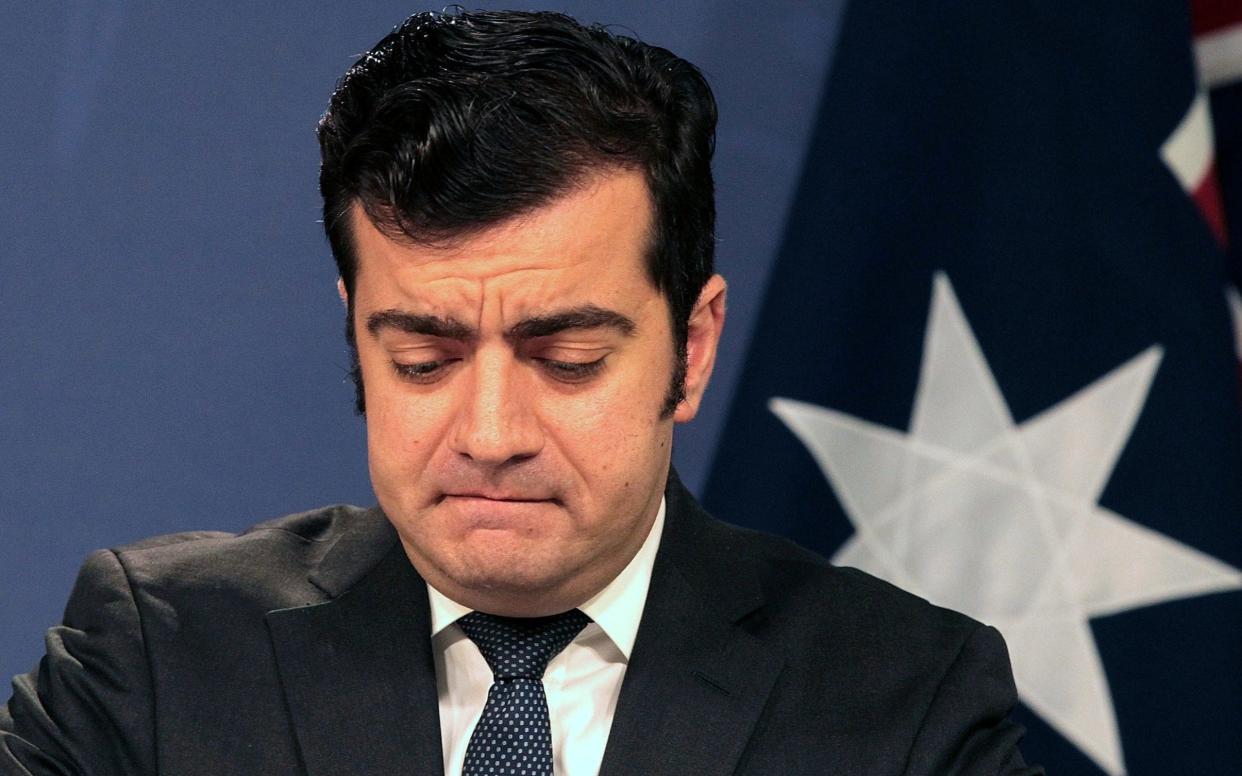 Australian opposition Senator Sam Dastyari reacts as he speaks during a media conference in Sydney, Australia, December 12 - REUTERS