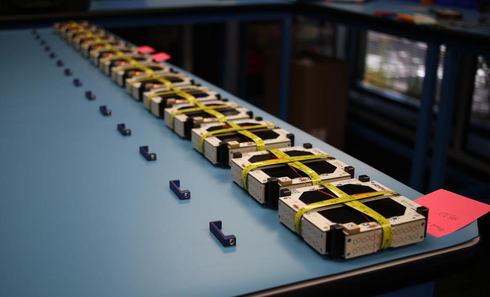 Swarm's tiny satellites lined up before launch.