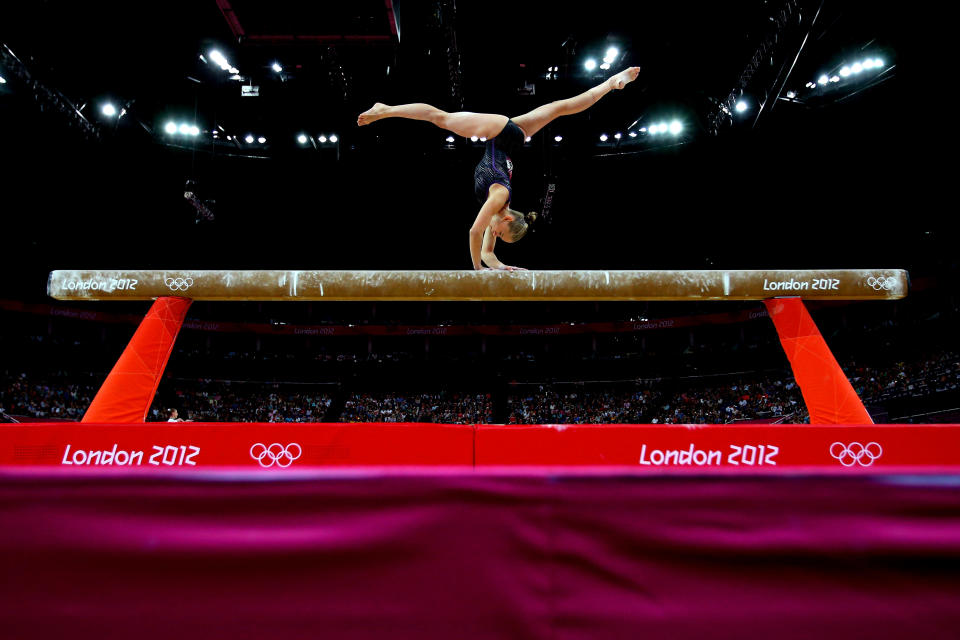 LONDON, ENGLAND - JULY 29: Laura Svilpaite of Lithuania competes on the beam in the Artistic Gymnastics Women's Team qualification on Day 2 of the London 2012 Olympic Games at North Greenwich Arena on July 29, 2012 in London, England. (Photo by Cameron Spencer/Getty Images)