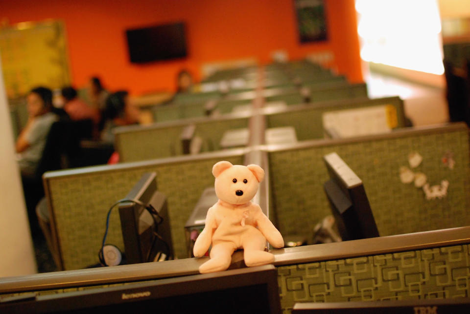 FILE PHOTO:  A teddy bear sits on a divider in a call center in Taguig City south of Manila, on December 2, 2011 in Manila, Philippines. (Photo: Dondi Tawatao/Getty Images)