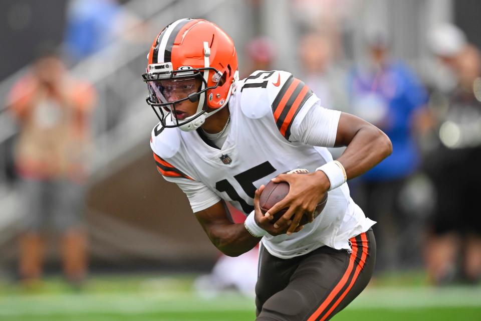 Cleveland Browns quarterback Joshua Dobbs (15) runs in for a touchdown against the Philadelphia Eagles during the first half of an NFL preseason football game in Cleveland, Sunday, Aug. 21, 2022. (AP Photo/David Richard)