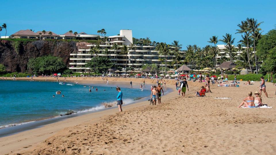 PHOTO: People enjoying the beach and ocean on a beautiful sunny day on Kaanapali beach. (Michael Siluk/Education Images/Universal Images Group via Getty Images)
