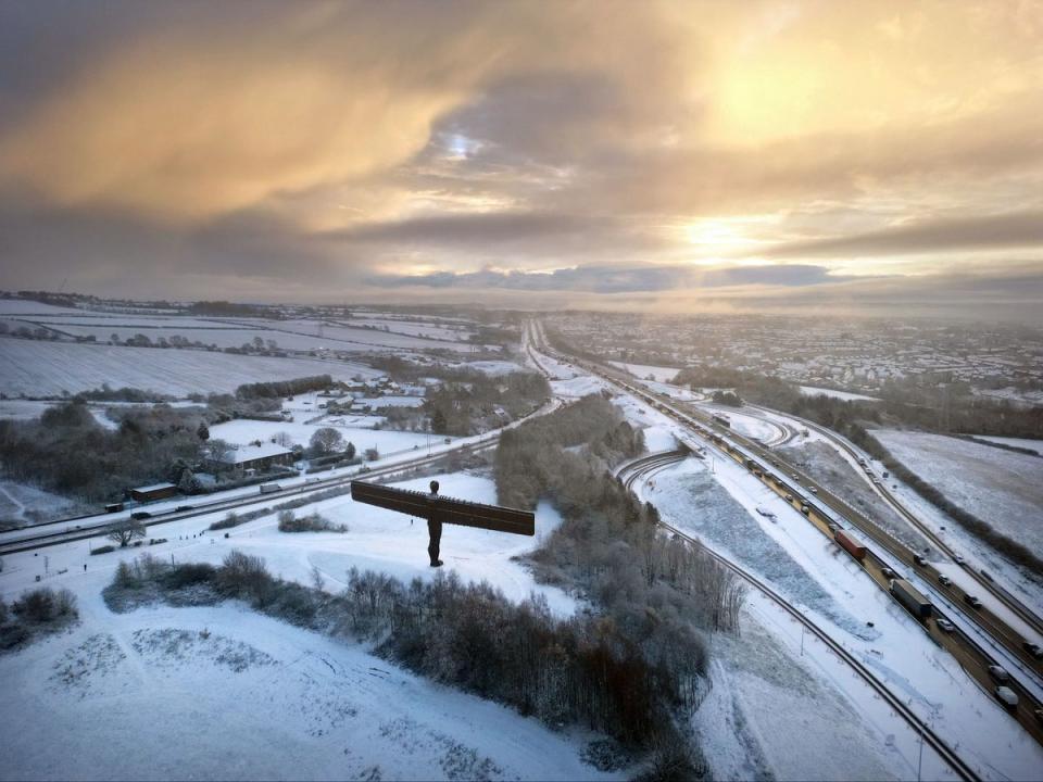 The Angel of the North statue in Gateshead covered in snow (PA)